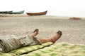 Bare foots relaxing in beach Royalty Free Stock Photo