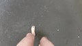 Bare hairy legs quickly walk on sand of sea beach POV