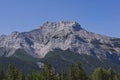 Bare mountain peak against blue sky Royalty Free Stock Photo