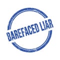 BAREFACED LIAR text written on blue grungy round stamp Royalty Free Stock Photo