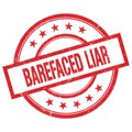BAREFACED LIAR text written on red vintage round stamp Royalty Free Stock Photo