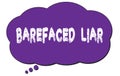 BAREFACED LIAR text written on a violet cloud bubble Royalty Free Stock Photo