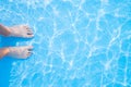 Barefoot and blue swimming pool Royalty Free Stock Photo