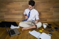 Young man working at home in funny clothes. Royalty Free Stock Photo