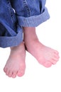 Barefoot child in jeans