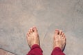 Barefoot on concrete surface Royalty Free Stock Photo