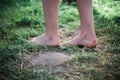 Barefoot feet woman walking on grass. Close-up. Nature. Royalty Free Stock Photo