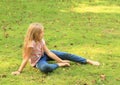 Barefoot girl on meadow