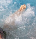 barefoot girl while taking bath in the thermal pool Royalty Free Stock Photo