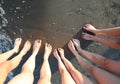 Barefoot of the happy family of five people with father mother a Royalty Free Stock Photo