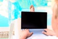 Barefoot male turn on the computer