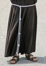 Barefoot with sandals and the habit of a Friar Royalty Free Stock Photo