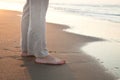 Barefoot woman on the beach Royalty Free Stock Photo