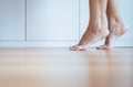 Barefoot woman clean and solf skin on wooden floor,Tiptoe Royalty Free Stock Photo