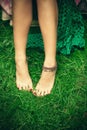 Barefoot woman feet on grass Royalty Free Stock Photo