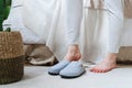 Barefoot woman in pajamas pants wearing slippers Royalty Free Stock Photo