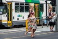 Barefoot woman returning from Melbourne Cup Royalty Free Stock Photo