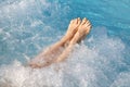 Barefoot girl while taking bath in the thermal pool Royalty Free Stock Photo