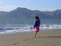 Barefooted beach girl