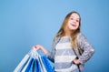 Bargain sale. Kid fashion. shop assistant with package. Sales and discounts. Small girl with shopping bags. Happy child Royalty Free Stock Photo