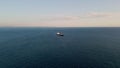 Barge carrier floating ocean surface drone view. Container tanker moving in sea Royalty Free Stock Photo