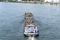 A barge carrying scrap metal on the Rhine in western Germany. Royalty Free Stock Photo