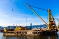 Barge dredging a harbor Royalty Free Stock Photo