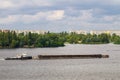Barge floating on the Dnieper river Royalty Free Stock Photo