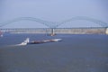 Barge on Mississippi River with Bridge and Memphis, TN in background