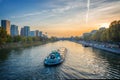 Barge on the river Seine at sunset, Paris France Royalty Free Stock Photo