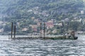 Barge sailing lake waters near Torno, Como, Italy