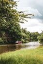 A barge sailing on the river Thames