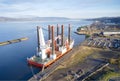 Barge ship crane construction at dock harbour in the sea ocean aerial view from above of shipbuilding Royalty Free Stock Photo