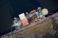 Barge ship crane construction at dock harbour in the sea ocean aerial view from above of shipbuilding Royalty Free Stock Photo