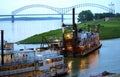 A Barge and Steam boat in the downtown Memphis harbor