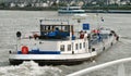 Barge and tour boats on the Mosel River in Germany