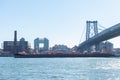 Barge Traveling Below the Williamsburg Bridge on the East River in New York City