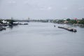 Barge and Tugboat cargo ship in Chao Phraya river Royalty Free Stock Photo