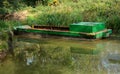 Barge in need of restoration. Wey & Arun Canal, Sussex, UK