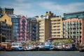 Barges and boats moored on river Thames