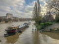 Barges on the flooded Seine River, winter 2018, in Paris, France Royalty Free Stock Photo