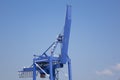 Barges moored in front of a container terminal, waiting their turn to load or discharge