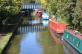 Barges moored to the bank on the Grand Union Canal at Lapworth in Warwickshire, England Royalty Free Stock Photo