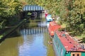 Barges moored to the bank on the Grand Union Canal at Lapworth in Warwickshire, England Royalty Free Stock Photo