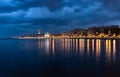 Bari italy night cityscape coastline from sea. City lights