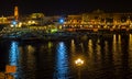 Bari night seafront and city lights.