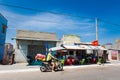 Tourist in fron of Local fishermen houses in vietnam coastline road