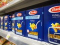 Barilla Fusilli Senza Glutine italian pasta that are formed into corkscrew or helical shapes on the supermarket shelves.