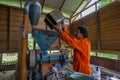 Local farmer preparing a traditional Bario paddy