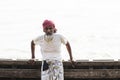 Barisal, Bangladesh, February 27 2017: Senior man posing at the pier